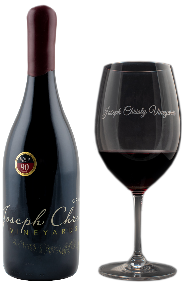JC2018Award-with-glass Joseph Christy wine bottle next to logo glass